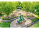 Aerial view of a playground featuring play equipment, a swing set, and walking paths at 12024 John Newton Dr, Davidson, NC 28036