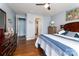 Comfortable bedroom with connecting bathroom and wooden floors at 132 Hillston Ln, Mooresville, NC 28115
