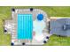 Aerial view of a large community pool with lap lanes, lounge chairs, and umbrella seating at 132 Hillston Ln, Mooresville, NC 28115
