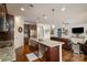 Spacious kitchen island with stainless steel appliances in an open concept home design at 132 Hillston Ln, Mooresville, NC 28115