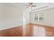 Spacious bedroom features tray ceilings, ceiling fan, and a large window at 133 Yellowbell Rd, Mooresville, NC 28117