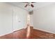 Bedroom featuring hard wood floors, ceiling fan and closet at 133 Yellowbell Rd, Mooresville, NC 28117