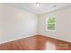 Bright bedroom with hardwood floors and large window at 133 Yellowbell Rd, Mooresville, NC 28117