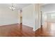 Elegant dining room featuring hardwood floors, wainscoting, and an adjacent butler's pantry at 133 Yellowbell Rd, Mooresville, NC 28117