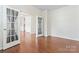Office space with hardwood floors, glass doors, natural light and easy access to other rooms at 133 Yellowbell Rd, Mooresville, NC 28117