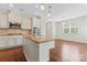 Gourmet kitchen featuring granite countertops, stainless steel appliances, and ample cabinet space at 133 Yellowbell Rd, Mooresville, NC 28117