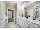 Bright bathroom features double vanities with white cabinets, granite counters, and a modern design at 1432 Ardmore Dr # 341, Sherrills Ford, NC 28673