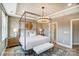 Main bedroom suite featuring a four-poster bed, decorative lighting and stylish decor at 1432 Ardmore Dr # 341, Sherrills Ford, NC 28673