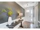 Stylish entryway featuring a wooden console table, decorative lamp, vase, and views of the front door at 1432 Ardmore Dr # 341, Sherrills Ford, NC 28673