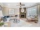 Cozy living room featuring a fireplace, a comfortable couch, an accent chair, and a window with natural light at 1432 Ardmore Dr # 341, Sherrills Ford, NC 28673