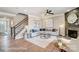 Living room with staircase, fireplace, comfortable seating, and stylish decor, creating a welcoming ambiance at 1432 Ardmore Dr # 341, Sherrills Ford, NC 28673