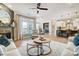 Bright living area open to kitchen with seating, fireplace, large windows, and contemporary design elements at 1432 Ardmore Dr # 341, Sherrills Ford, NC 28673
