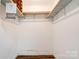 Unfinished basement area with wood beams and concrete walls at 1529 Stony Point Rd, Shelby, NC 28150