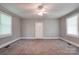 Spacious bedroom features a ceiling fan, window and a closet door at 1529 Stony Point Rd, Shelby, NC 28150
