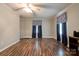 Bright living room offers wood flooring and decorative window curtains at 1529 Stony Point Rd, Shelby, NC 28150