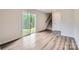 Finished basement area with a sliding door to the backyard and stairs to the upper level at 1543 Cottage Creek Dr, Bessemer City, NC 28016
