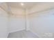 Walk-in closet with wire shelving for organized storage at 1543 Cottage Creek Dr, Bessemer City, NC 28016