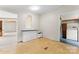 Bright dining area featuring tile flooring and built in cabinets with easy access to washer and dryer at 1773 Baldwin Ln, Lincolnton, NC 28092