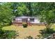 Charming single-story home with a welcoming front porch and landscaped front yard at 1773 Baldwin Ln, Lincolnton, NC 28092