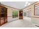 Bright living room with large windows, neutral carpet, and decorative wood cabinets at 1773 Baldwin Ln, Lincolnton, NC 28092