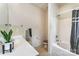 Bathroom with tub and shower and a tiled floor at 1825 Stroud Park Ct, Charlotte, NC 28206