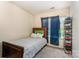 Bedroom featuring a twin bed and blue curtains at 1825 Stroud Park Ct, Charlotte, NC 28206