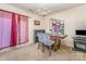 Dining area featuring modern chairs and a rustic table at 1825 Stroud Park Ct, Charlotte, NC 28206