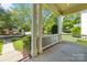 Covered front porch featuring white railings and support columns at 187 Water Oak Dr, Mooresville, NC 28117
