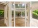 Charming gazebo featuring wood flooring and providing a tranquil spot surrounded by trees at 187 Water Oak Dr, Mooresville, NC 28117