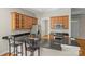 Kitchen with stainless appliances, granite counters, ample cabinets and breakfast bar at 187 Water Oak Dr, Mooresville, NC 28117