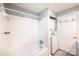 Clean, full bathroom with tub/shower combination and stackable washer and dryer at 2309 13Th Street Ne Dr, Hickory, NC 28601