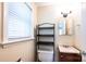 Bathroom featuring a sink and vanity and a toilet with shelving at 2309 13Th Street Ne Dr, Hickory, NC 28601