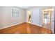 Bedroom with hardwood floors, natural light and a hallway view to the bathroom at 2309 13Th Street Ne Dr, Hickory, NC 28601