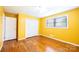 Bedroom with hardwood floors, closet space, and a window for natural light at 2309 13Th Street Ne Dr, Hickory, NC 28601