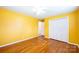 Bedroom with hardwood floors, closet space, and a window for natural light at 2309 13Th Street Ne Dr, Hickory, NC 28601