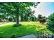 Lush front yard featuring a well-maintained lawn, creating a welcoming and picturesque entry to your home at 2309 13Th Street Ne Dr, Hickory, NC 28601