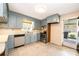 Practical kitchen features stainless steel appliances and a convenient door to the backyard at 2309 13Th Street Ne Dr, Hickory, NC 28601