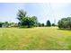 Expansive, well-maintained lawn with mature trees offering a peaceful ambiance at 2309 13Th Street Ne Dr, Hickory, NC 28601