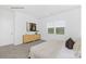 Comfortable bedroom with neutral decor and a large window at 239 Paige Rd, Kings Mountain, NC 28086