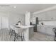 Inviting kitchen with an island, stainless steel appliances, and stylish bar stool seating at 239 Paige Rd, Kings Mountain, NC 28086