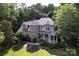 Aerial view of a stately home showcasing well-manicured landscaping, stone accents, and a gazebo at 2541 Penngate Dr, Sherrills Ford, NC 28673