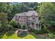Aerial view of a home with stone accents, gazebo, and lush landscaping at 2541 Penngate Dr, Sherrills Ford, NC 28673