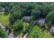 Beautiful aerial view of a home surrounded by lush greenery and a well-manicured lawn at 2541 Penngate Dr, Sherrills Ford, NC 28673