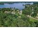 Aerial shot showcases stunning lakefront property with lush trees and beautiful waterfront views at 2541 Penngate Dr, Sherrills Ford, NC 28673