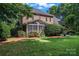 Home exterior with screened porch and patio, situated on a lush green lawn at 2541 Penngate Dr, Sherrills Ford, NC 28673