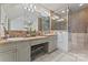 Tiled bathroom with double sink vanity and glass-enclosed shower at 2541 Penngate Dr, Sherrills Ford, NC 28673