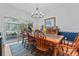 Elegant dining room with chandelier and access to sunroom at 2541 Penngate Dr, Sherrills Ford, NC 28673