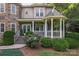 Home's cozy front porch with gazebo, white columns, and lush greenery welcomes visitors at 2541 Penngate Dr, Sherrills Ford, NC 28673