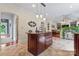 Open kitchen features a center island, tile flooring, and stainless steel appliances at 2541 Penngate Dr, Sherrills Ford, NC 28673