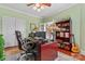 Spacious office with hardwood floors, built in shelves, and desk at 2541 Penngate Dr, Sherrills Ford, NC 28673